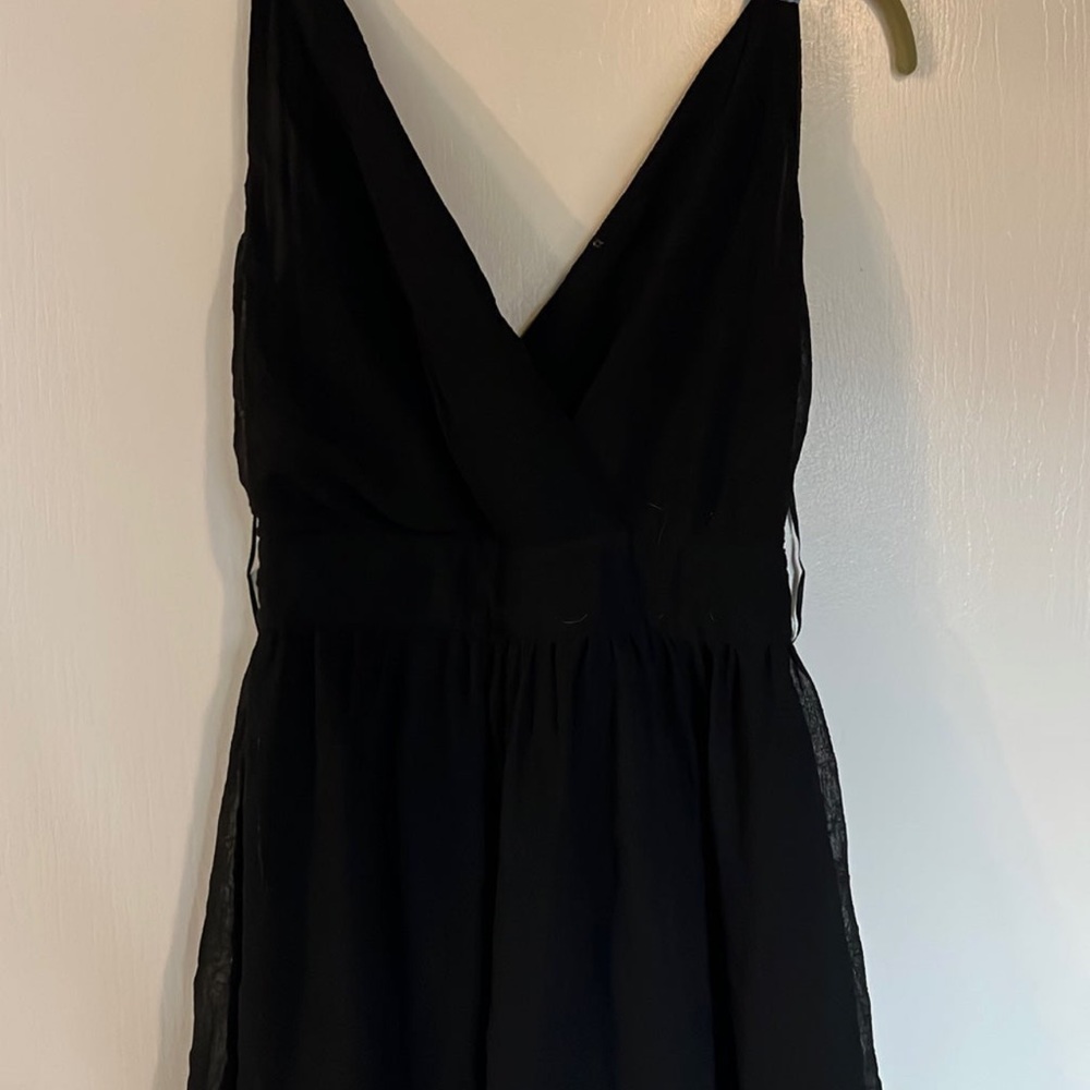 Black romper with blue straps